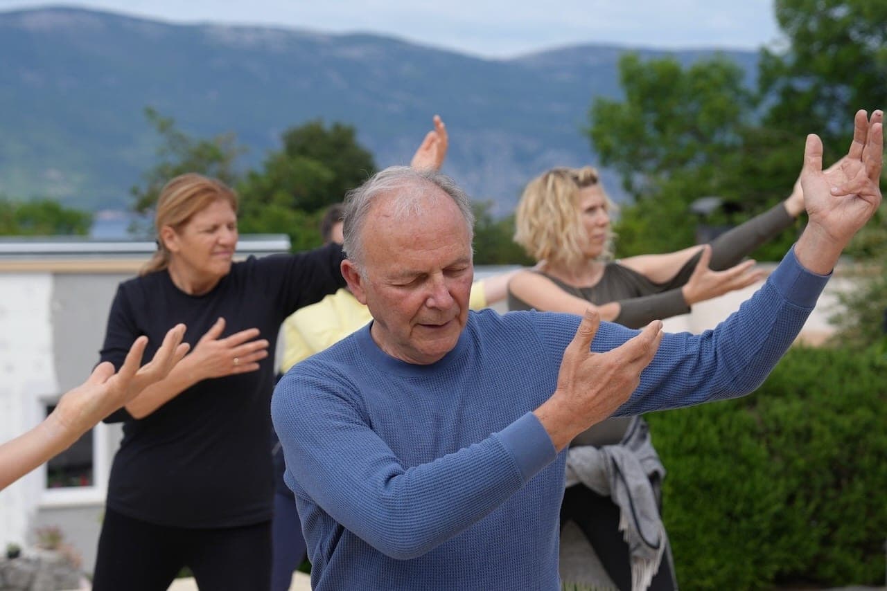 Outdoor group practice above the sea at the HOMER Center